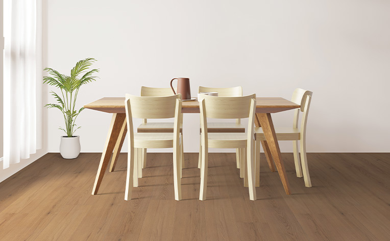 warm toned vinyl plank flooring in Scandinavian inspired dining room